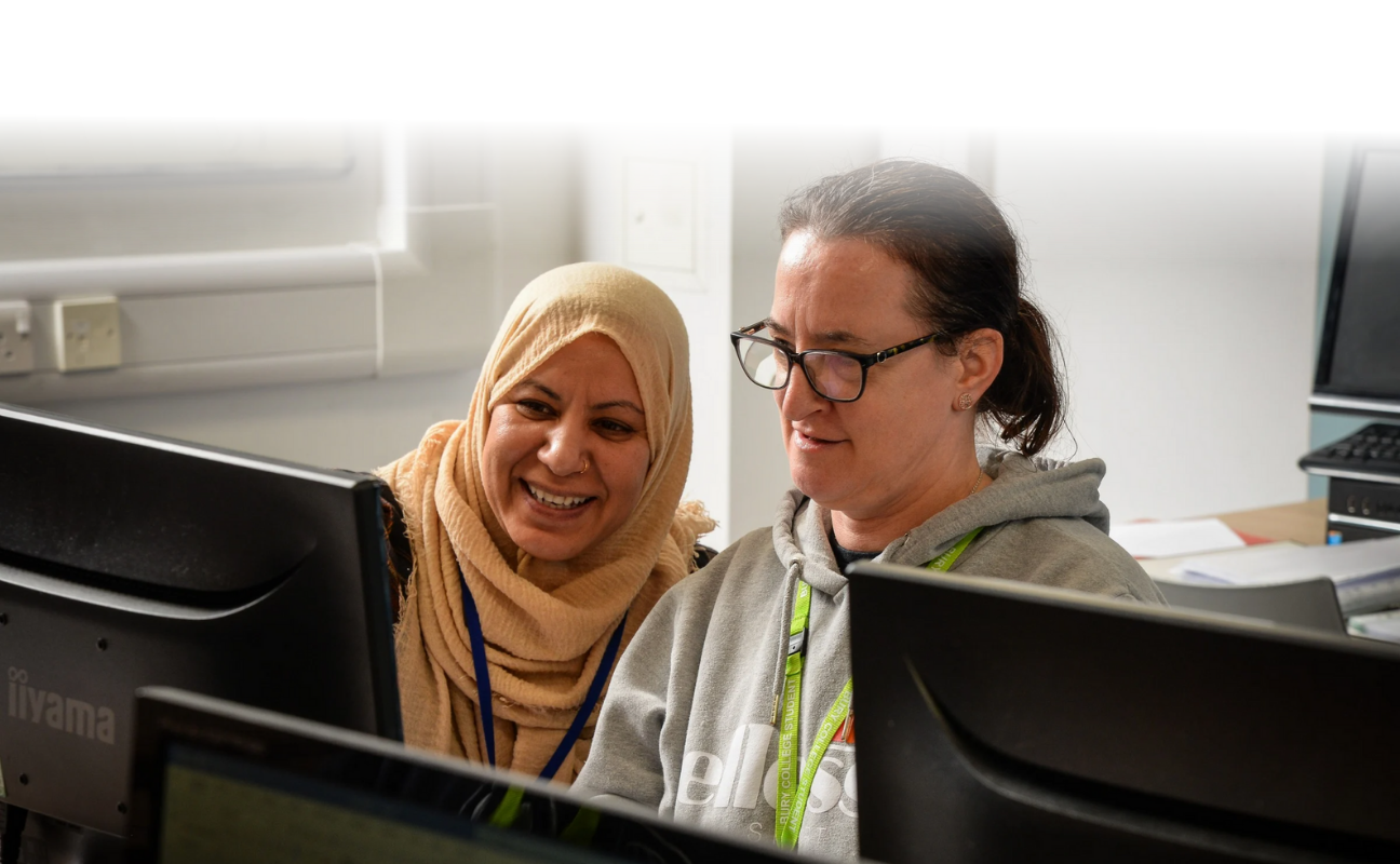 Adult learner and tutor during a lesson