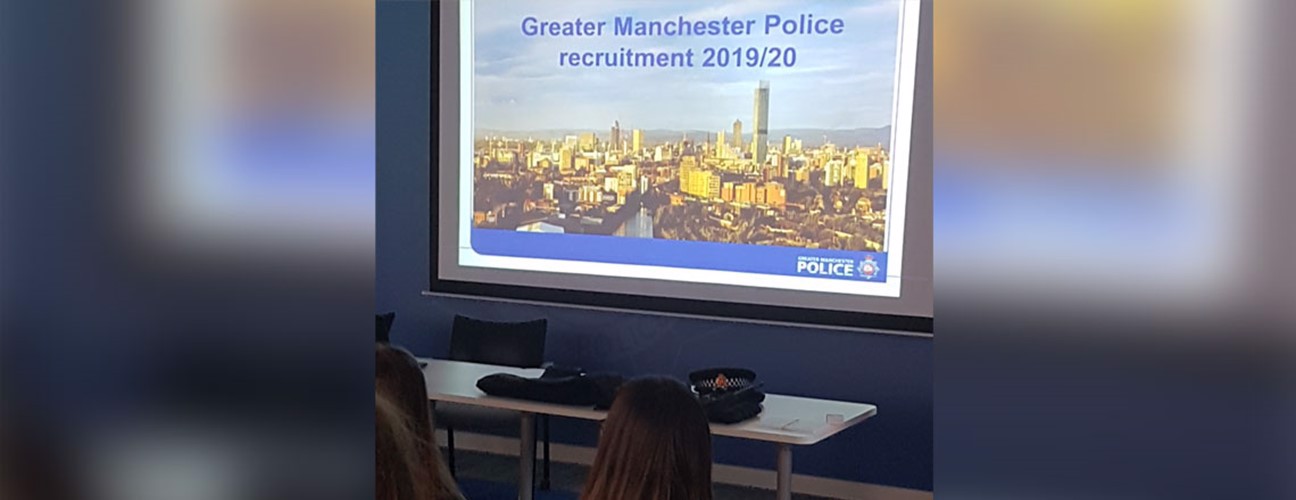 Bury College Public Services students sat at a Greater Manchester Police recruitment event