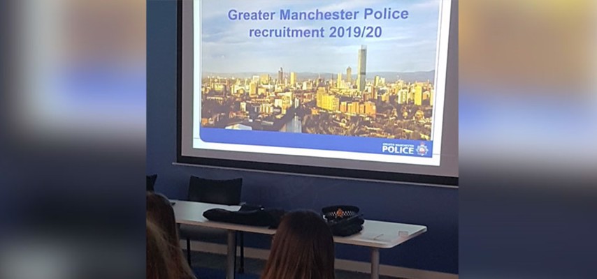 Bury College Public Services students sat at a Greater Manchester Police recruitment event