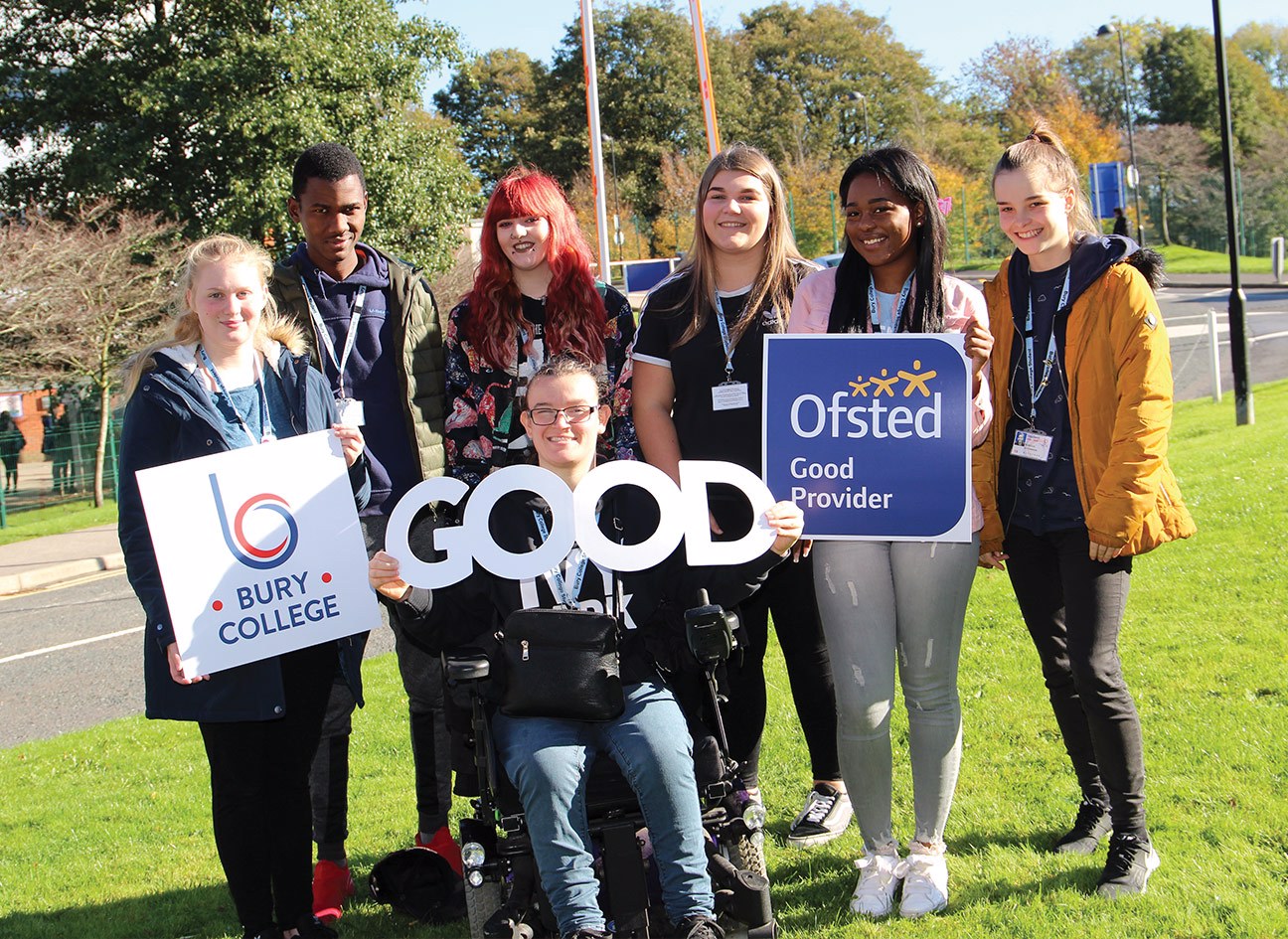 Ofsted Good - Students holding a sign spelling the word "good"