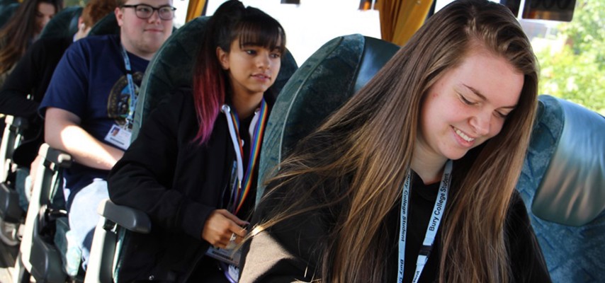 Students sat on a coach