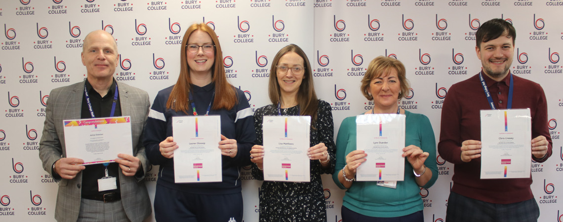 Bury College staff with certificates 