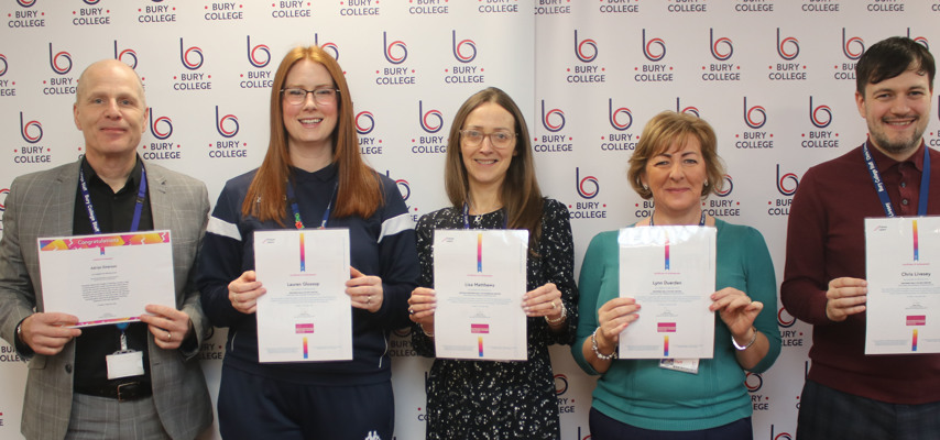 Bury College staff with certificates 