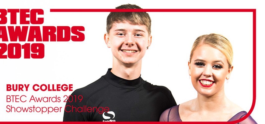 Ellie Bennett and Joshua Smart on a BTEC Awards 2019 banner