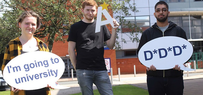 A group of Bury College students celebrating their grades
