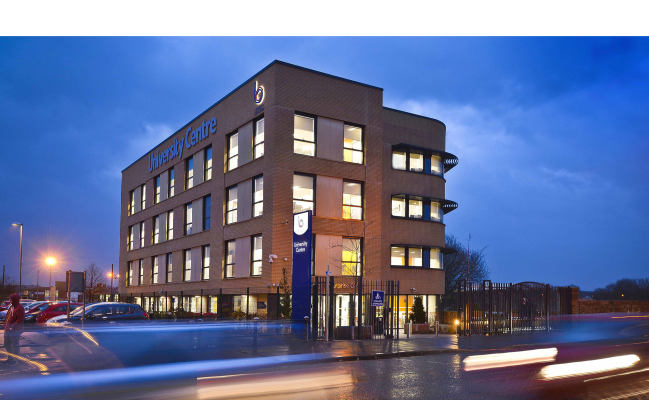 Bury College University Centre at night