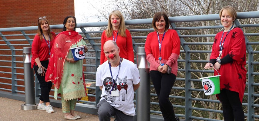 Group of Bury College staff supporting a Comic Relief charity drive 