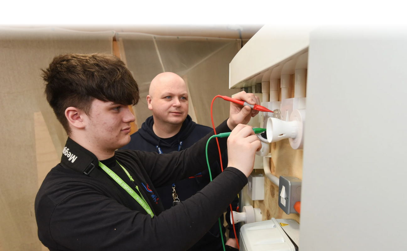electrical student in a classroom with teacher