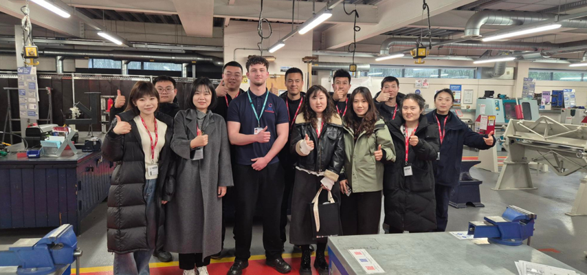a row of Chinese delegacy students visiting Bury College
