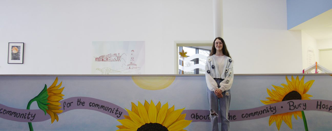 Student with artwork
