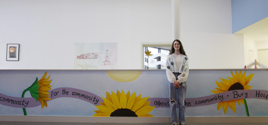 Student with artwork