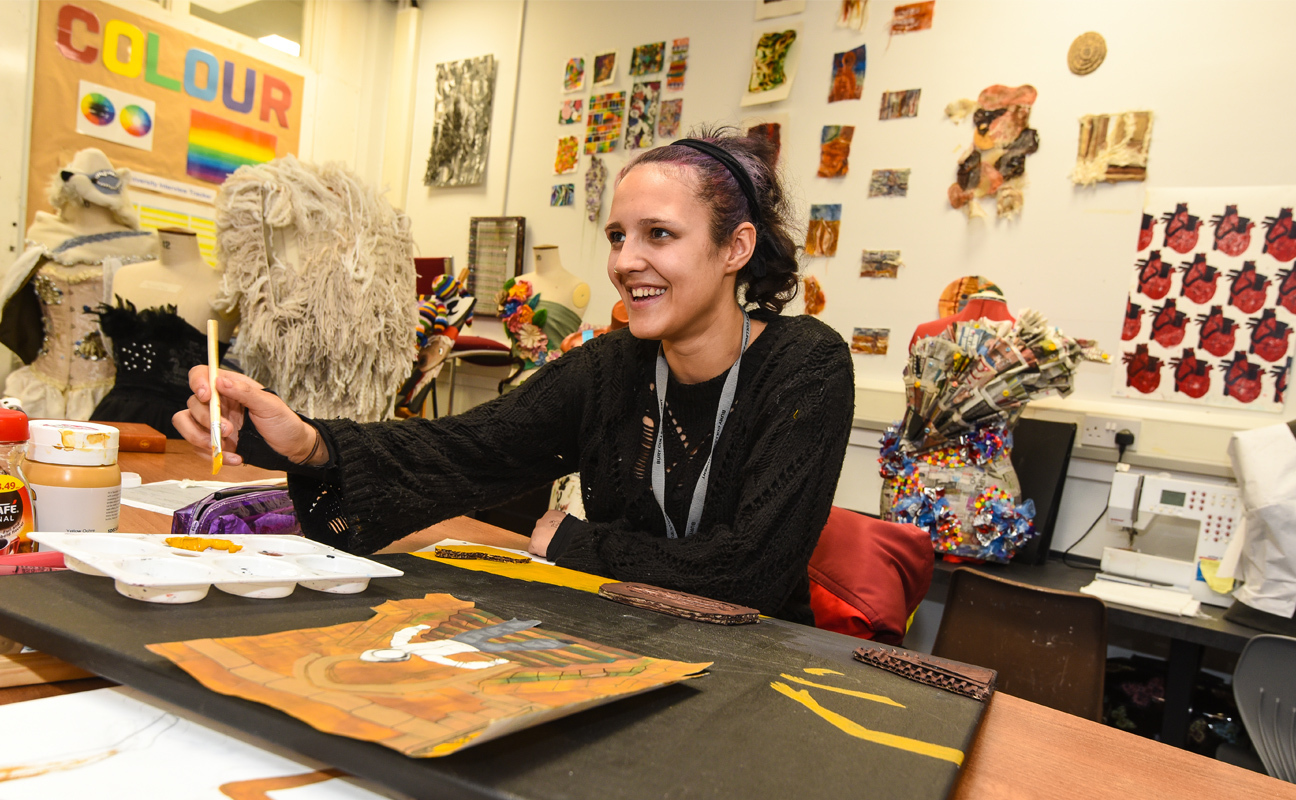 Art, Design and Media student doing practical work the design studio