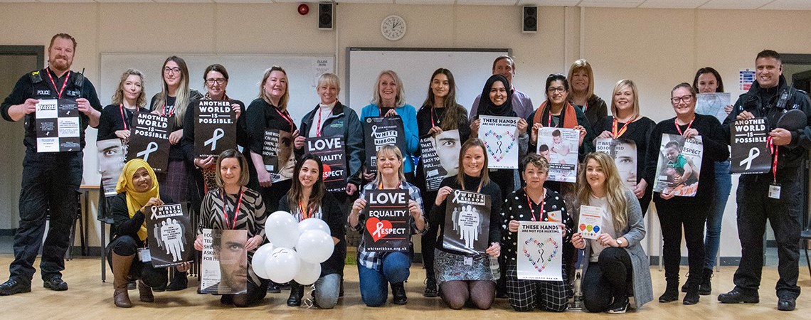 Bury College students hosting the 2019 Domestic Violence and Abuse White Ribbon Campaign event