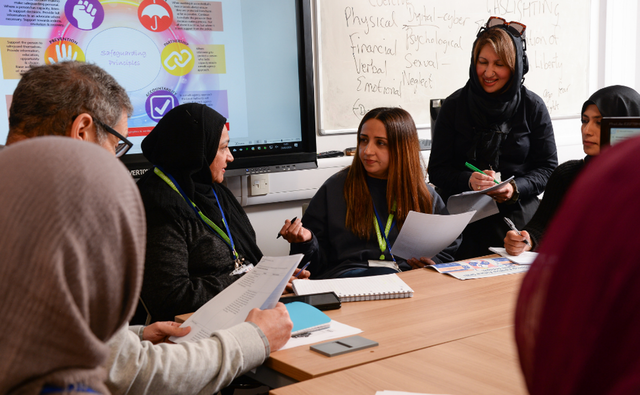 Adult learners taking part in a community interpreting lesson