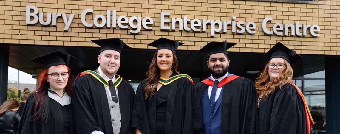 5 Students in gowns and caps at Bury College University Centre’s Graduation Ceremony