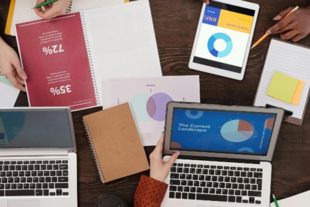 business meeting desk with charts