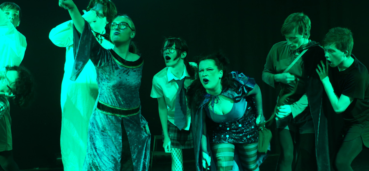 performing arts students performing in panto