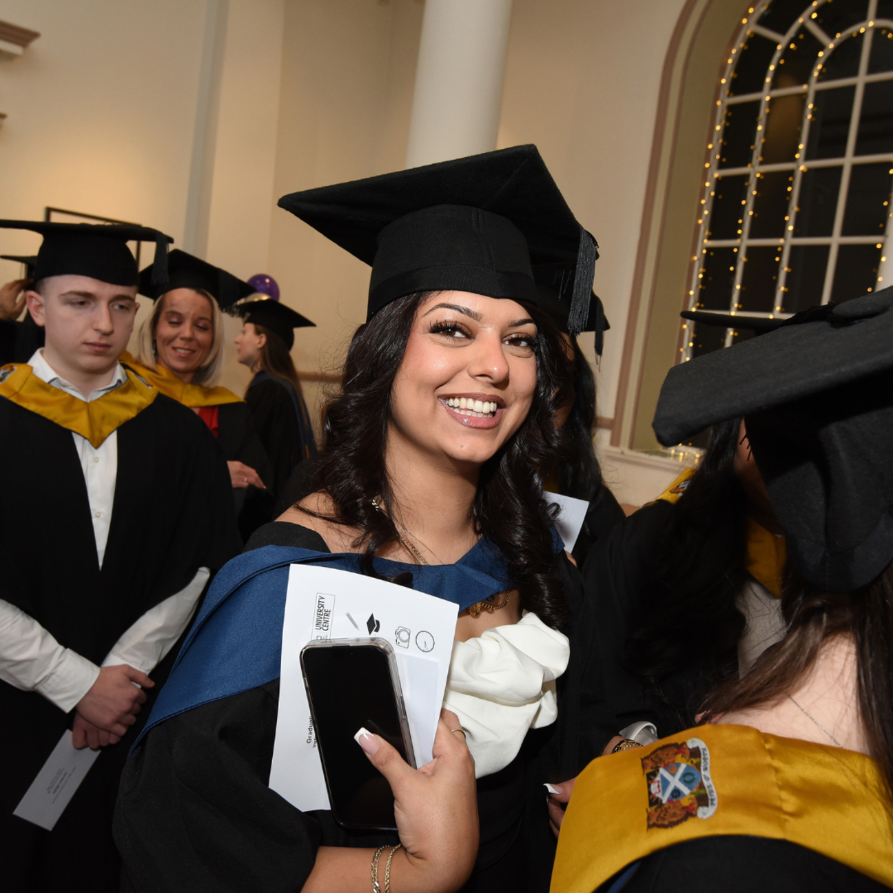 student on their graduation day stood in a line