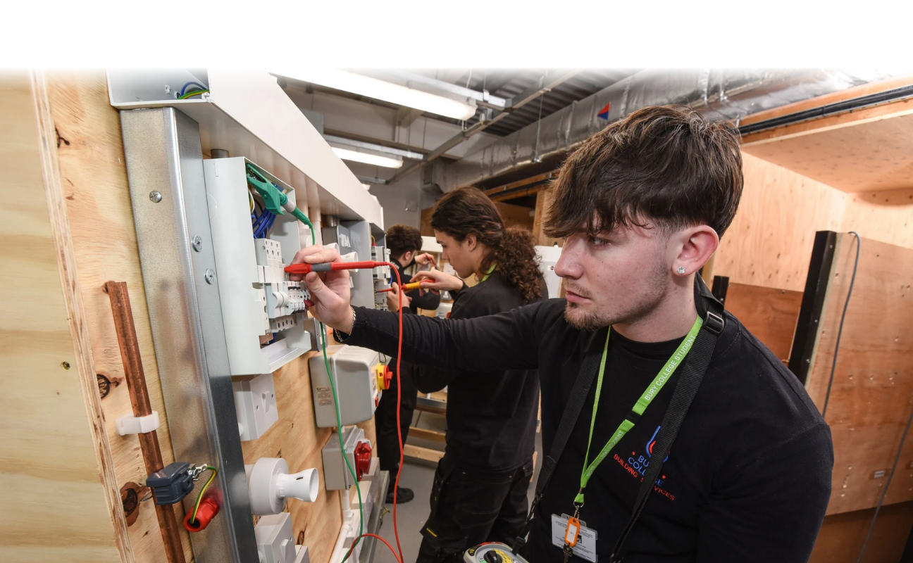 electrical installation student working on an electrical unit
