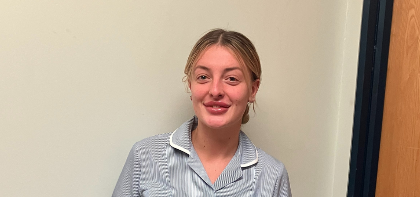 a former student wearing nurse uniform