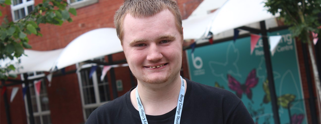 A-level learner, Nick Brown stood into front of the Bury College Learning Resource Centre