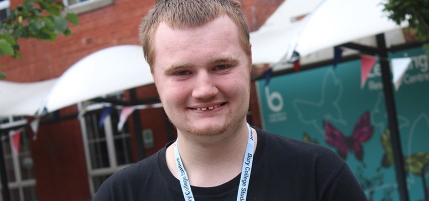A-level learner, Nick Brown stood into front of the Bury College Learning Resource Centre