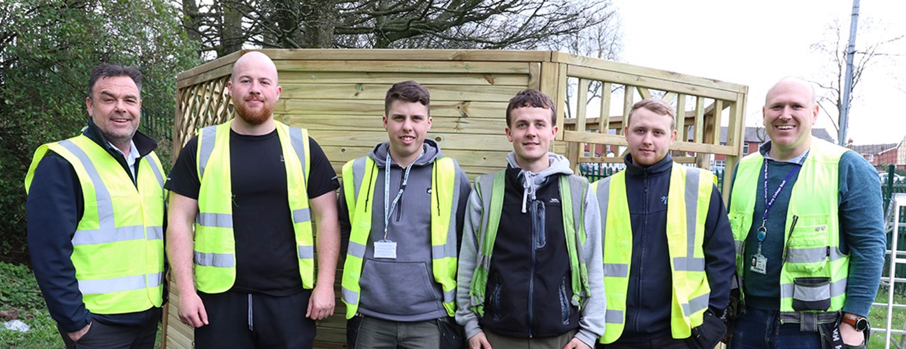 A group of Joinery Apprentices stood on site