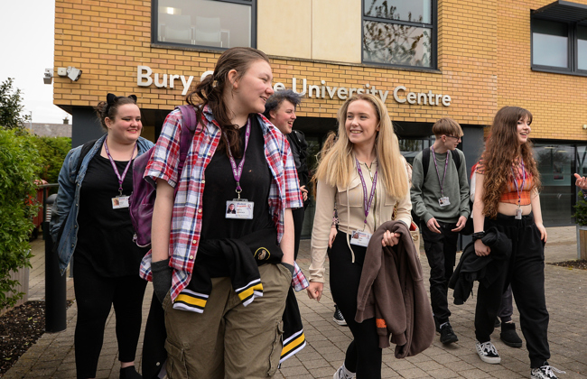 Students walking outside the entrance of the Bury College University Centre