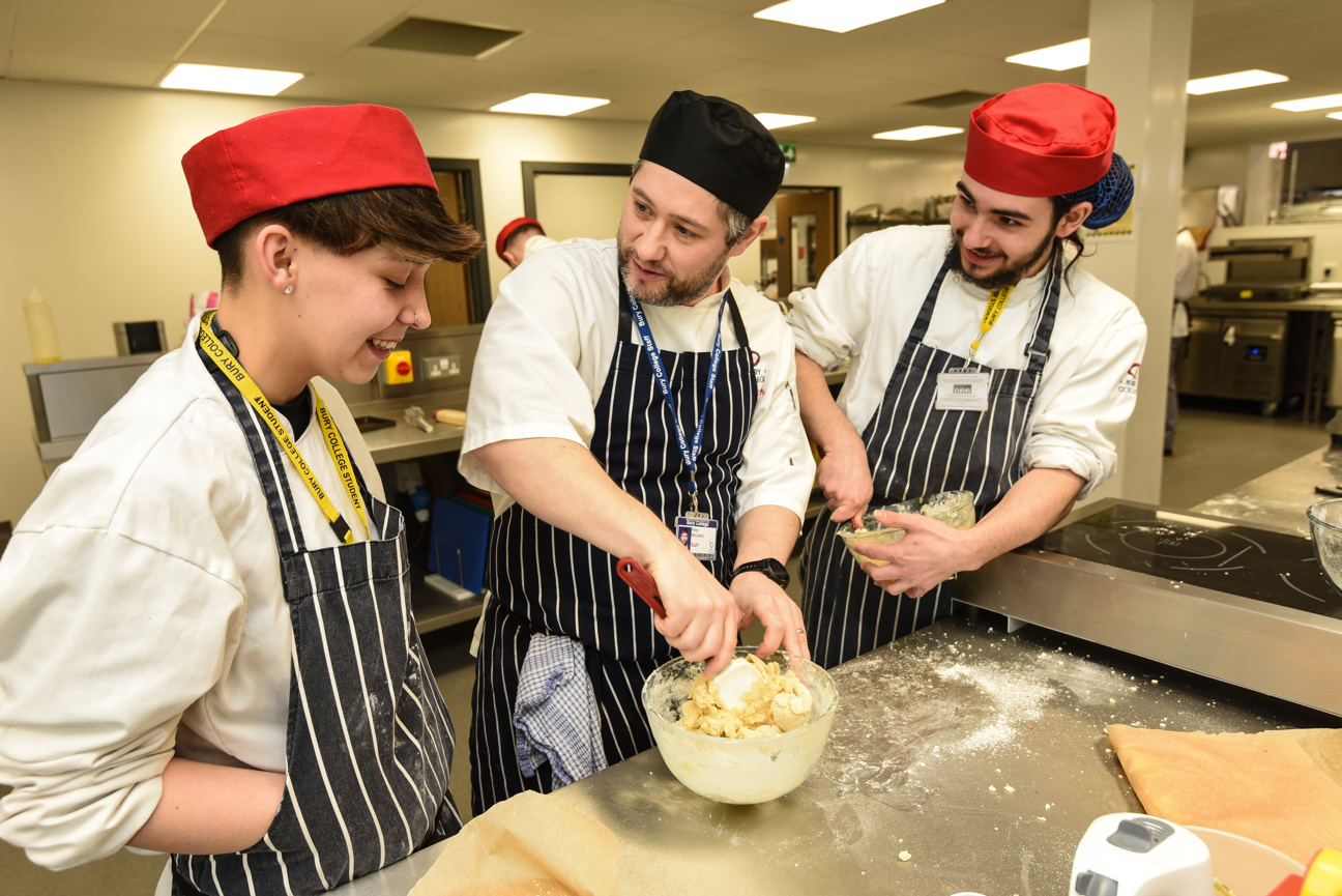 students in a catering class with teacher