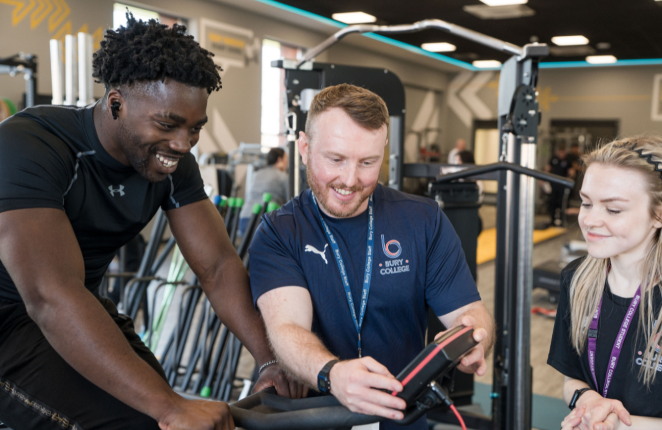 Adult sport learners taking part in a practical activity in the gym