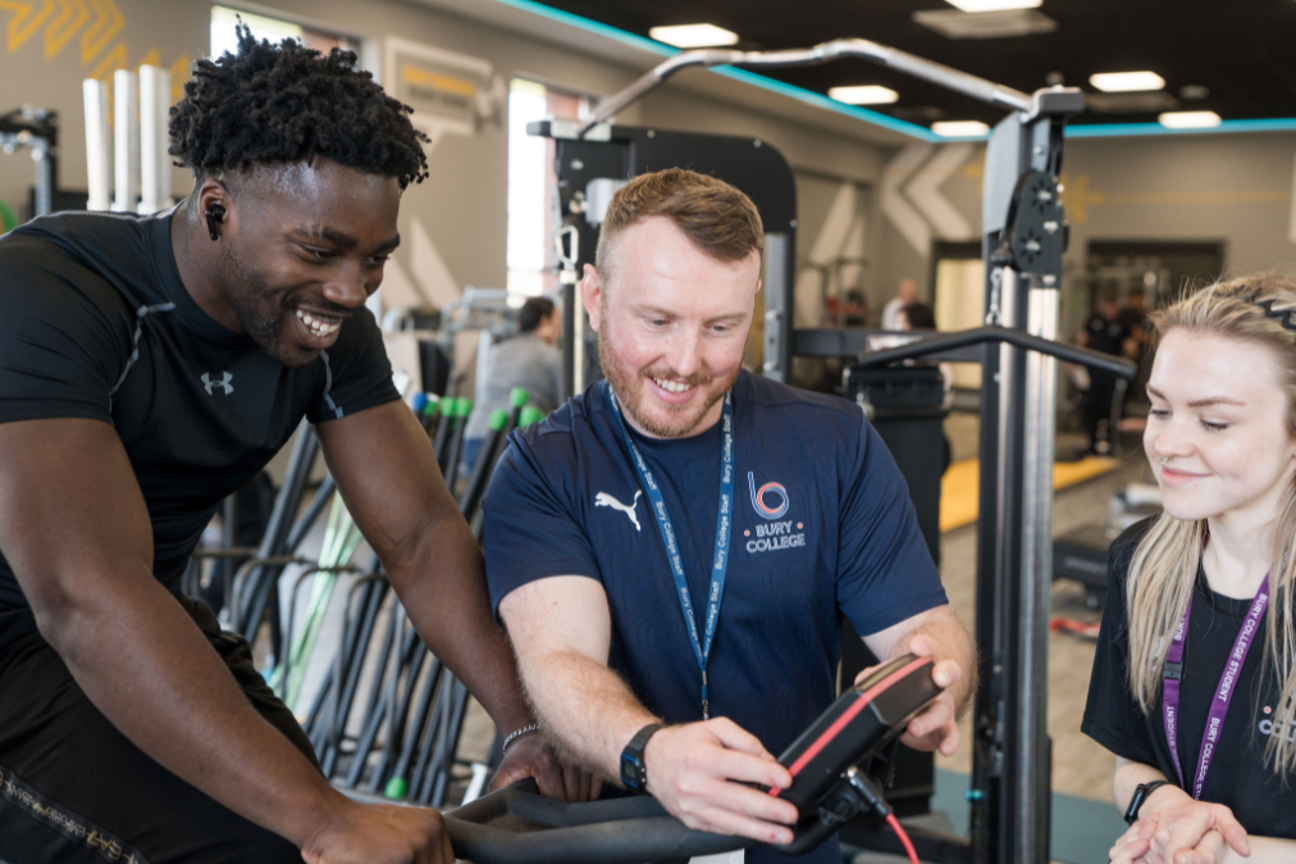 Adult sport learners taking part in a practical activity in the gym