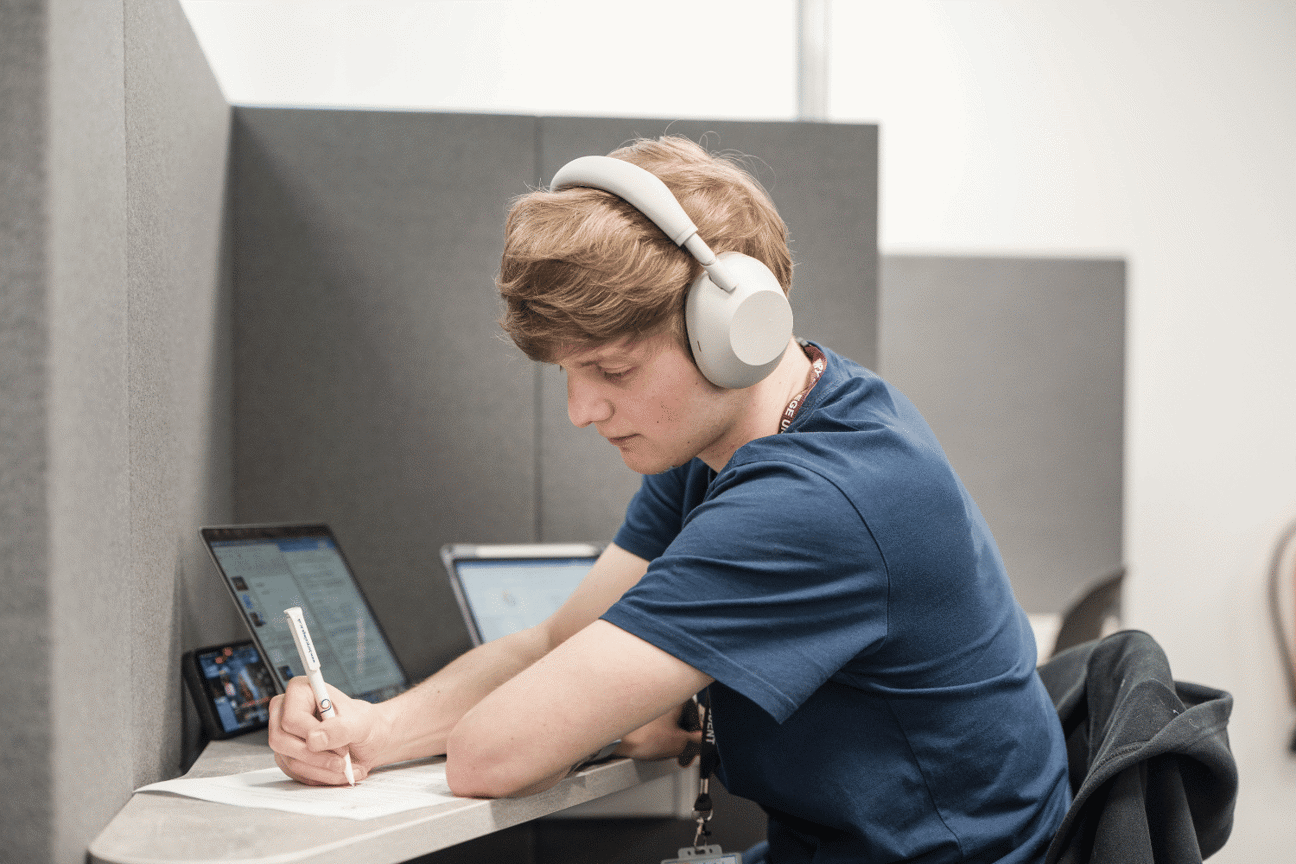Adult learner studying in the library