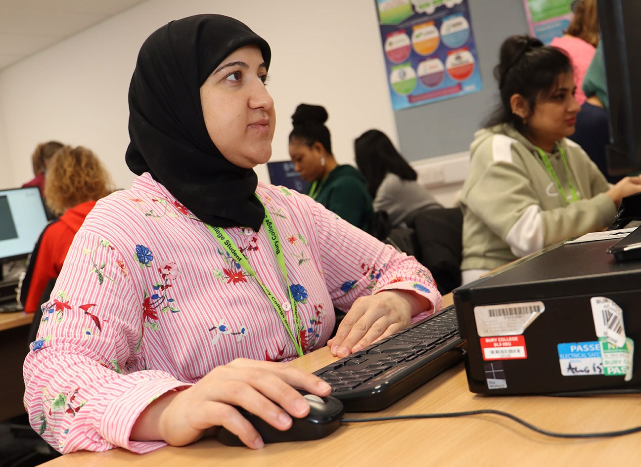 Adult learner using a computer