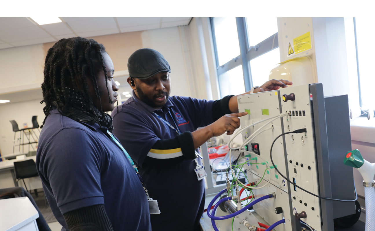 T Level Engineering and Manufacturing student using equipment in the workshop