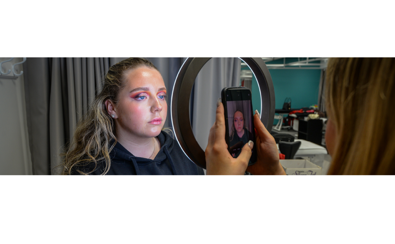 Image of a girl with her makeup done. 