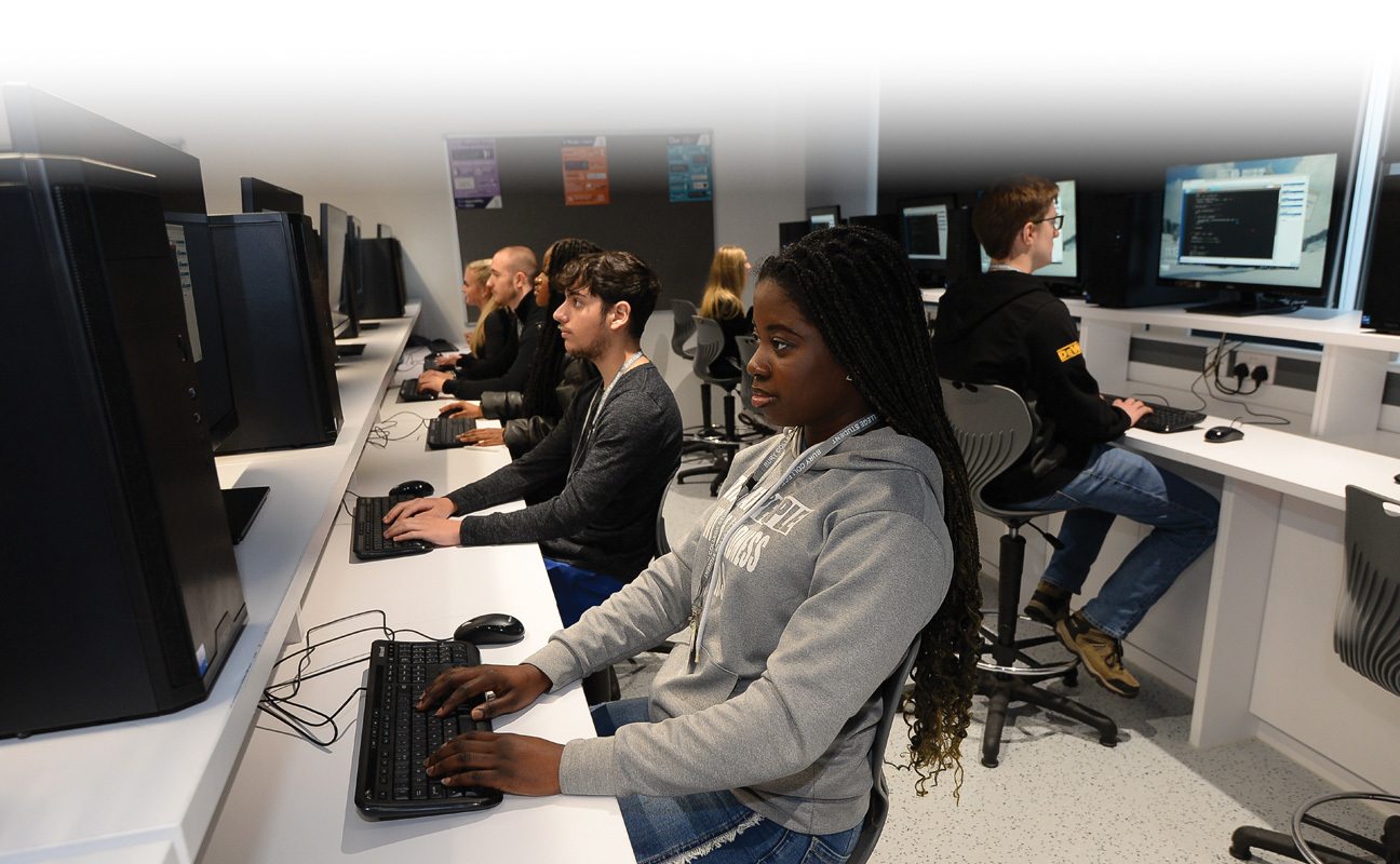 T Level digital students working in an IT suite