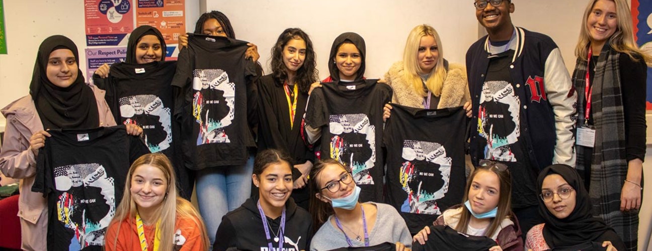 NCS students holding up their t-shirt creations