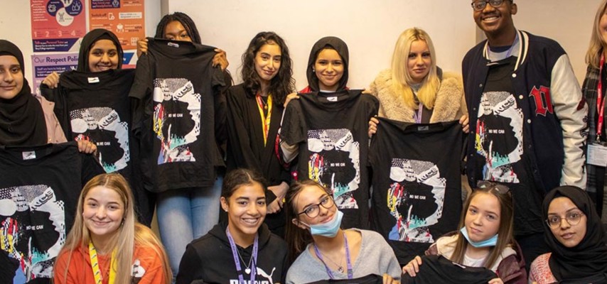 NCS students holding up their t-shirt creations