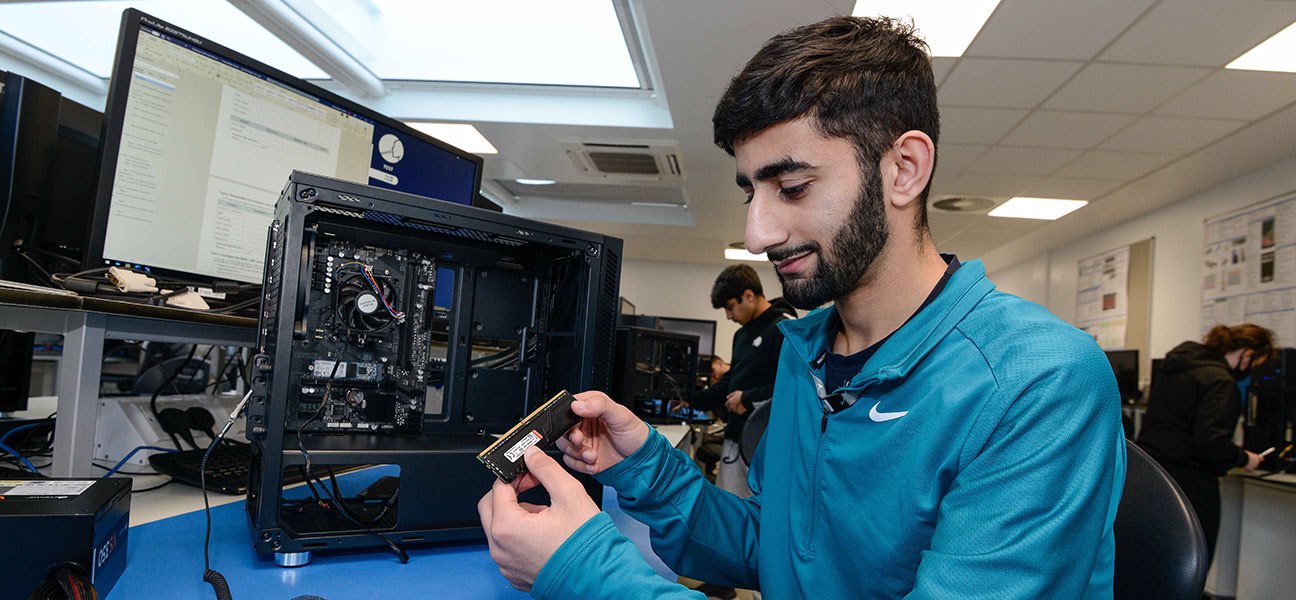 Student building a computer