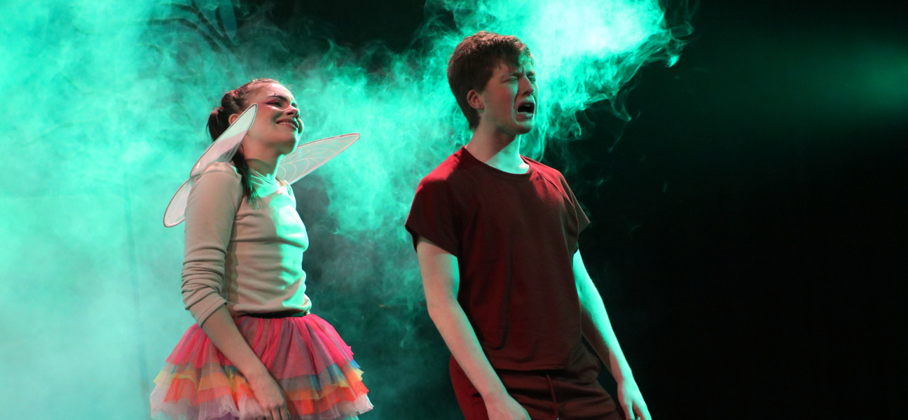 two performing arts students performing