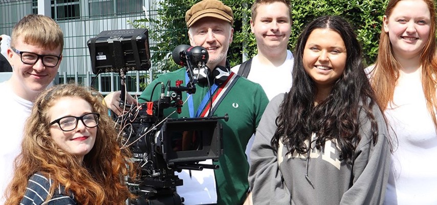 Media students behind the scenes of the production of an upcoming film