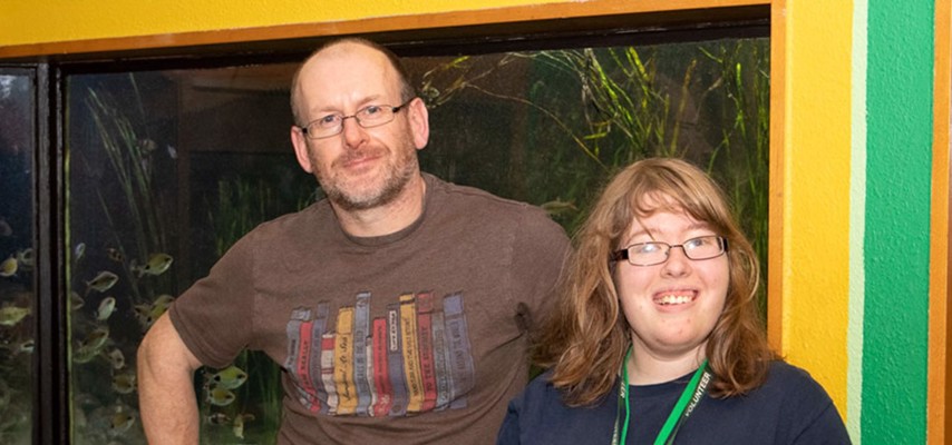 Rachael Scholes stood in front of the Aquarium based at Bolton Central Library and Museum