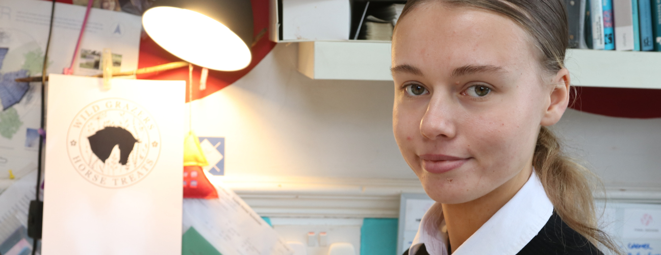 student sat at computer