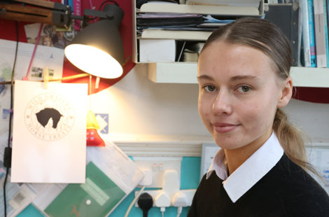 student sat at computer