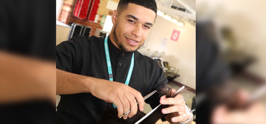 Bury College Barbering student cutting hair 