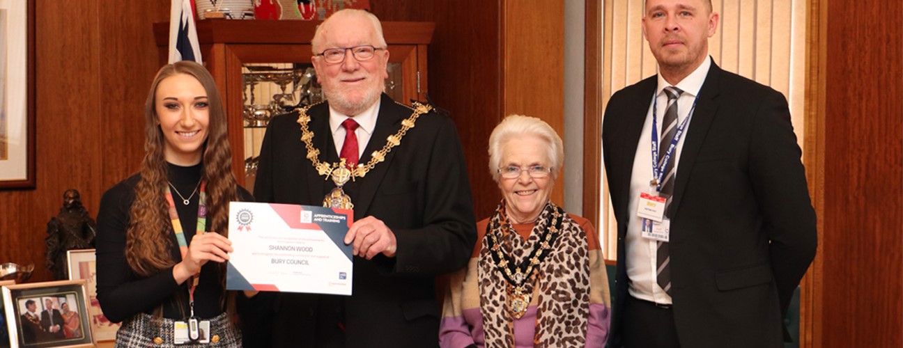 Business Administration apprentice Shannon Wood stood with the Mayor of Bury
