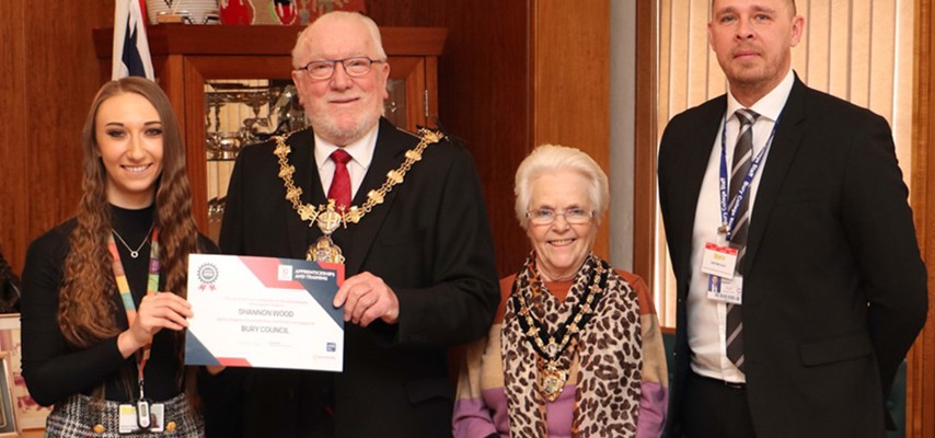 Business Administration apprentice Shannon Wood stood with the Mayor of Bury