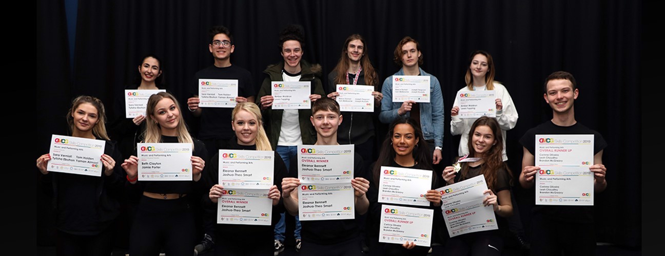 Performing Arts students holding their awards