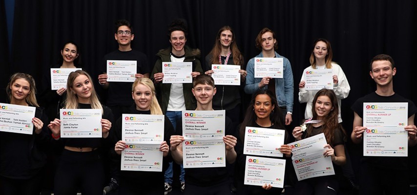 Performing Arts students holding their awards