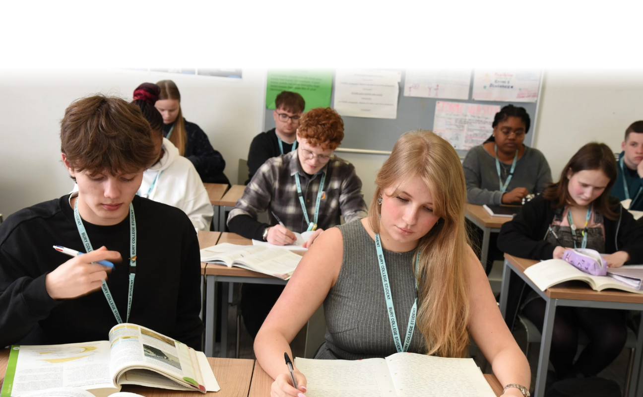 students sat working in a classroom